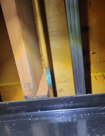 Basement framing during plumbing inspection in Gaithersburg, MD