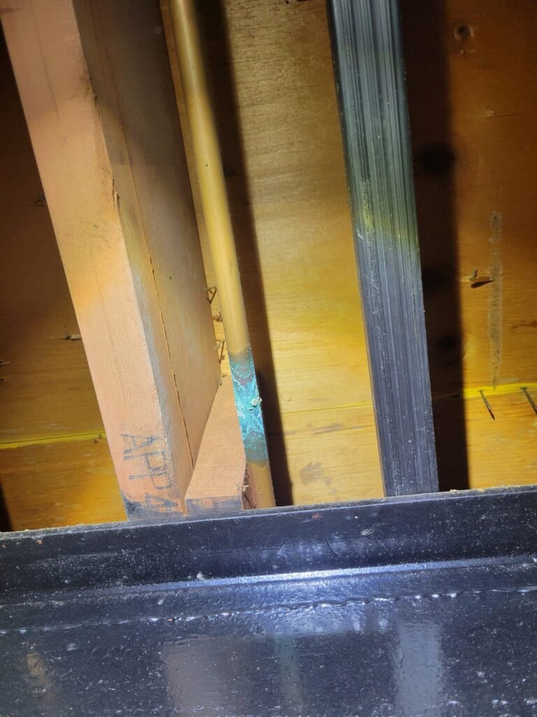 Basement framing during plumbing inspection in Gaithersburg, MD