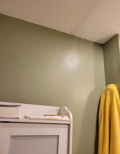 Bathroom wall finished after plumbing repair in Baltimore, MD