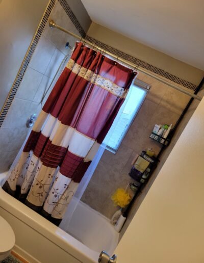 Bathtub and shower area after plumbing service in Seat Pleasant, MD