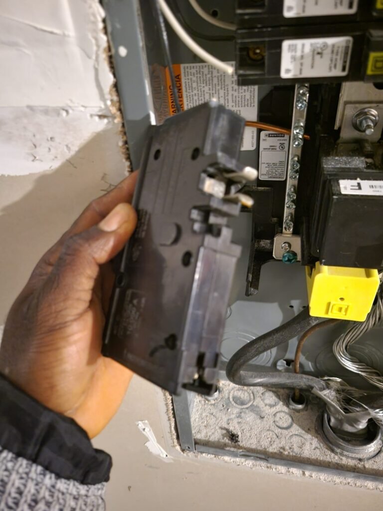 Electrician replacing a circuit breaker in a panel in Accokeek, MD