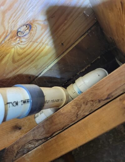 PVC drain pipe repair in a crawl space in Woodbridge, VA