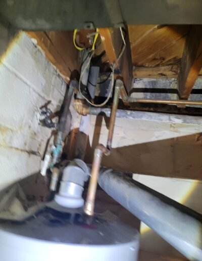 Drain line and fittings under a floor in Washington, DC
