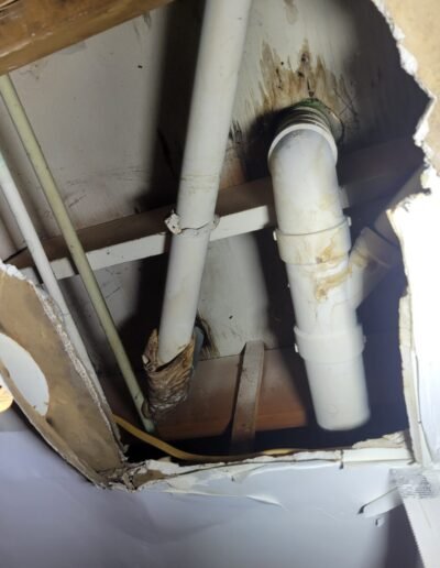 Leaking drain pipe found above a ceiling in Germantown, MD