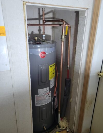 New electric water heater installed in a closet in Dunkirk, MD