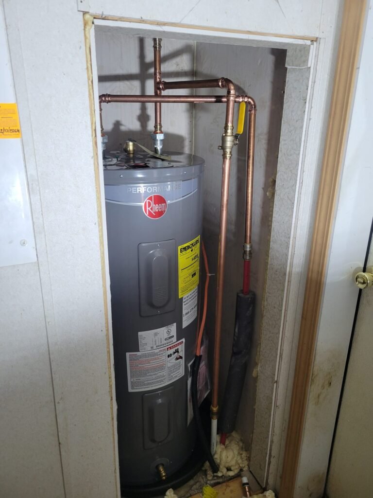 New electric water heater installed in a closet in Dunkirk, MD