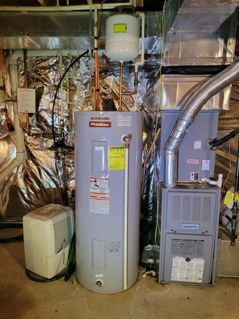 New A.O. Smith electric water heater with expansion tank installed in an Upper Marlboro, MD basement