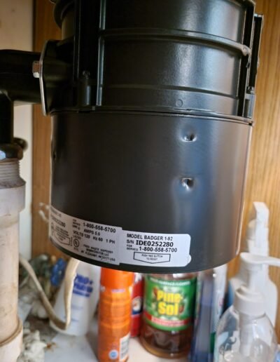 Garbage disposal replacement under a kitchen sink in Laurel, MD