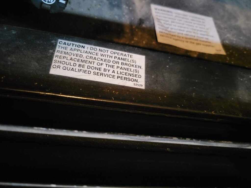 Burner access panel on a gas water heater in Waldorf, MD