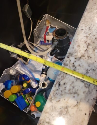 Measuring for a new kitchen sink installation in Temple Hills, MD