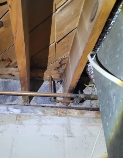 Water-damaged floor joists found during leak detection in Washington, DC