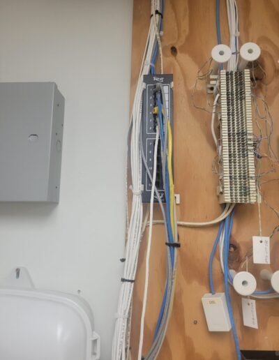 Low-voltage data wiring installed on a backboard in Columbia, MD
