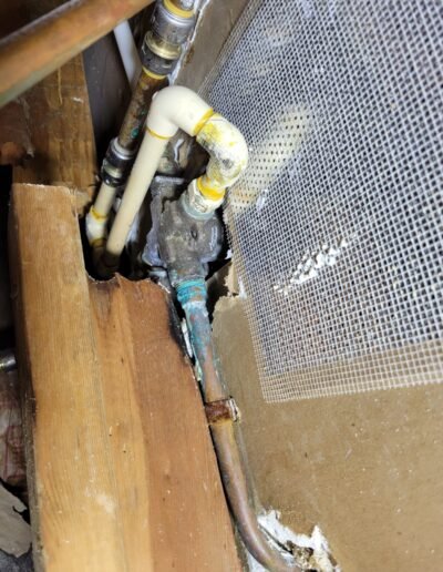 Plumbing pipe repair inside an opened wall in District Heights, MD