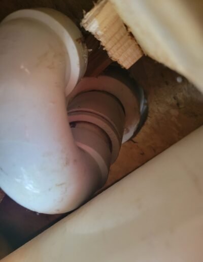 PVC drain pipe connection under a sink in Largo, MD