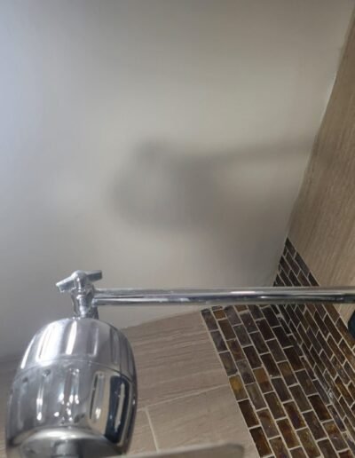 Wall-mounted rain shower head and arm in Gaithersburg, MD