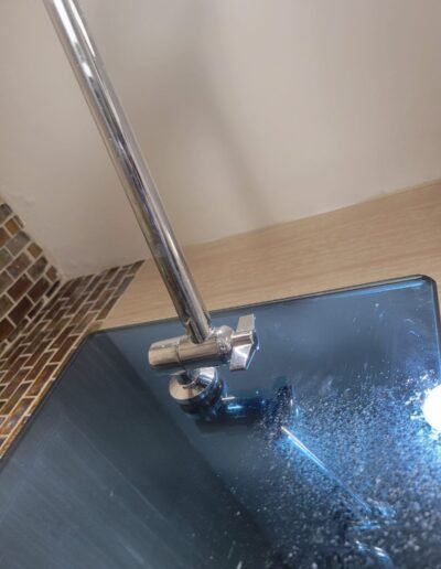 New shower arm installed over a tiled wall in Gaithersburg, MD