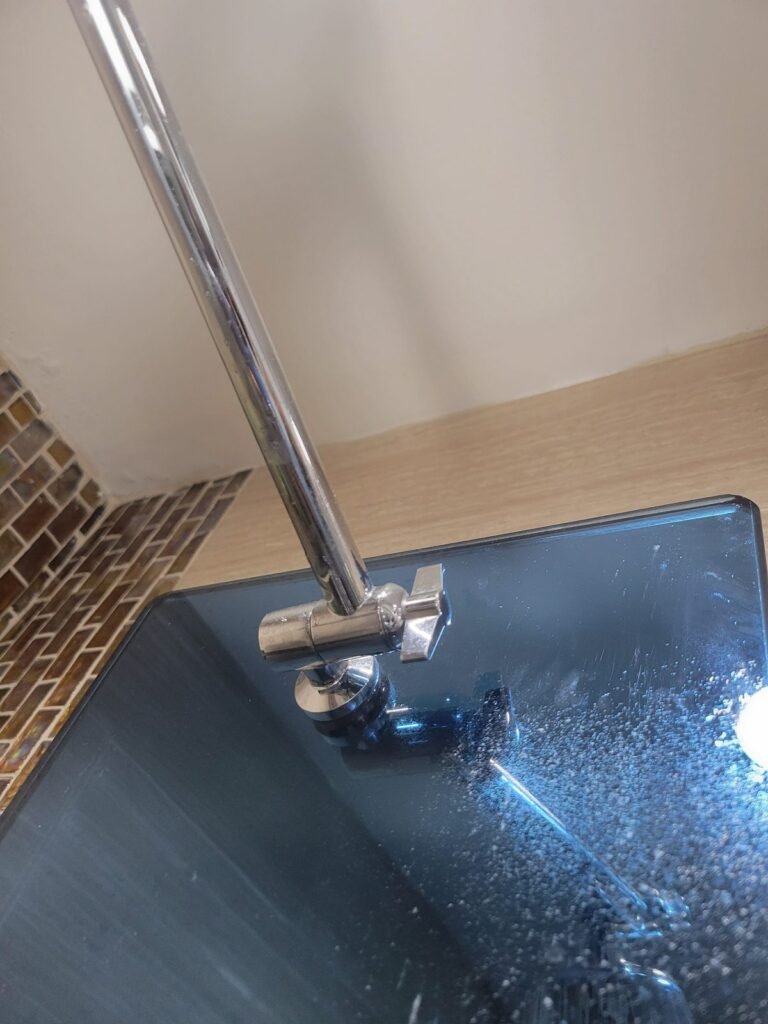 New shower arm installed over a tiled wall in Gaithersburg, MD
