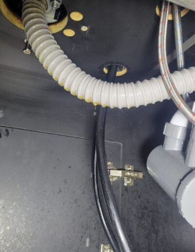New sink drain trap installed under a vanity in Gaithersburg, MD