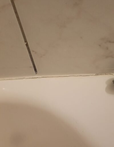 Tub drain and overflow plate after repair in Washington, DC