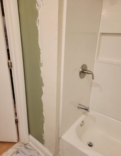 New tub spout and shower valve installed in surround in Baltimore, MD
