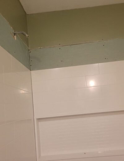 Tub surround panels installed on bathroom wall in Baltimore, MD