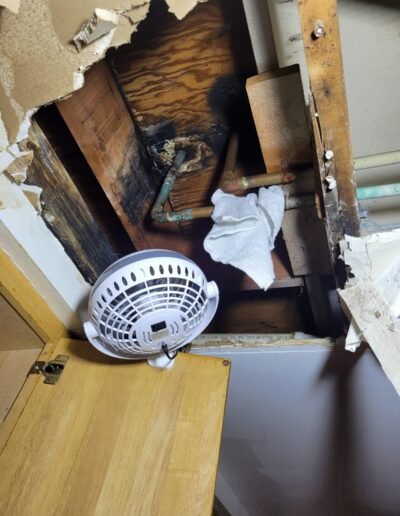 Water-damaged ceiling opened for leak repair in Germantown, MD