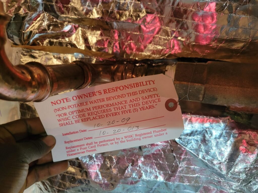Copper supply lines with an inspection tag after a water heater install in Upper Marlboro, MD