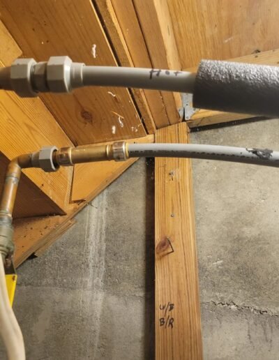 New water line installed under floor joists in Forestville, MD
