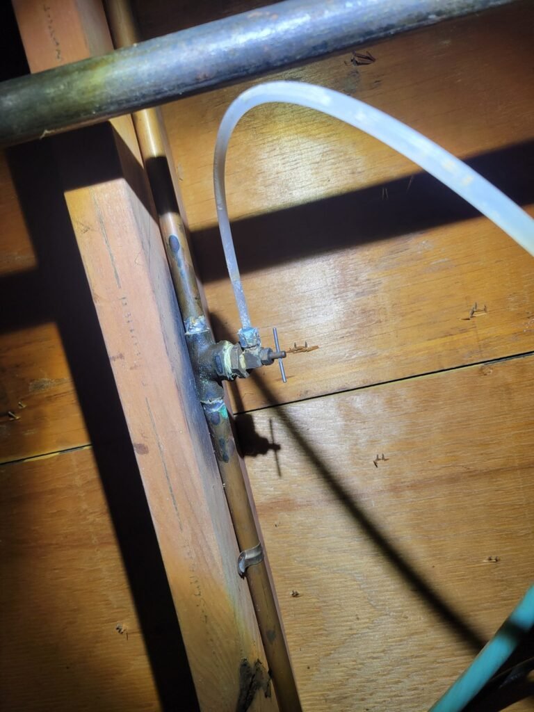New water supply line run through floor joists in Gaithersburg, MD